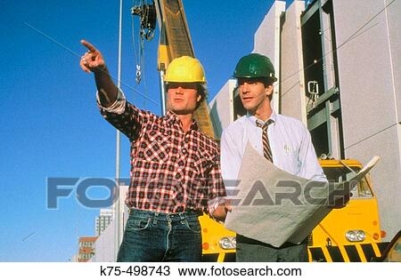 Engineer and foreman on job site View Large Photo Image Stock Image - Engineer and foreman on job site. Fotosearch