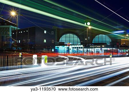 Stock Image - England, Greater London, London Borough of Camden Rush hour traffic outside the London King's Cross railway station and underground. Fotosearch