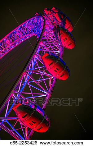 Stock Photograph - England, London, Southbank, The London Eye, evening.. Fotosearch