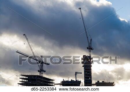 England, London, The City, construction cranes. View Large Photo Image Picture - England, London, The City, construction cranes.. Fotosearch