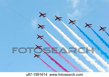 Picture - England, London, The Red Arrows Aerobatic Display Team in Formation During a Level Flypast.. Fotosearch