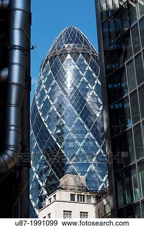 England, London, The Swiss Re Building? Gherkin?, Sir Norman Foster Building. View Large Photo Image Stock Photo - England, London, The Swiss Re Building? Gherkin?, Sir Norman Foster Building.. Fotosearch