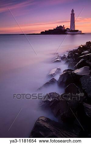 England, Tyne and Wear, St Mary's Island Pre-dawn pink skies above St Mary's Island and lighthouse, a popular location near Whitley Bay View Large Photo Image Picture - England, Tyne and Wear, St Mary's Island Pre-dawn pink skies above St Mary's Island and lighthouse, a popular location near Whitley Bay. Fotosearch