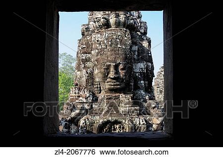 Enigmatic Lokesvara stone faces on the towers of the Bayon temple, Angkor Thom. Cambodia, Siem Reap, Angkor. View Large Photo Image Stock Photograph - Enigmatic Lokesvara stone faces on the towers of the Bayon temple, Angkor Thom. Cambodia, Siem Reap, Angkor.. Fotosearch