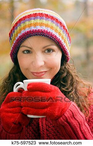 Enjoying a hot beverage View Large Photo Image Stock Image - Enjoying a hot beverage. Fotosearch