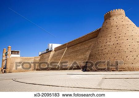 Stock Image - Entrance, outer walls and viewing gallery of the Ark Fortress, Registan Square, Bukhara, Uzbekistan.. Fotosearch