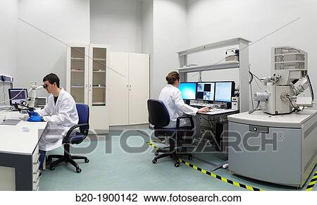 Environmental Scanning Electron Microscope ESEM QuantaTM 250 FEG provides access to studies of wet biological samples, nano-bio composites and nano-fluidic phenomena View Large Photo Image Stock Image - Environmental Scanning Electron Microscope ESEM QuantaTM 250 FEG provides access to studies of wet biological samples, nano-bio composites and nano-fluidic phenomena. Fotosearch