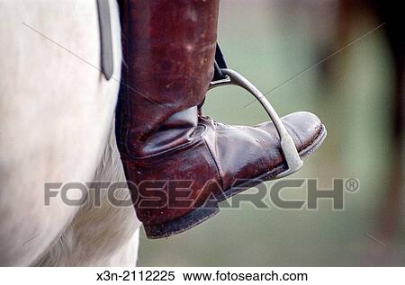 Equestrian boots on stirrups. View Large Photo Image Stock Photography - Equestrian boots on stirrups.. Fotosearch