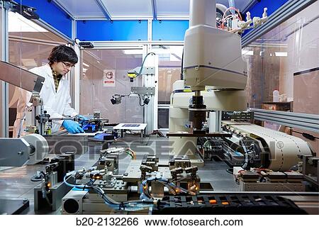 Stock Photograph - Equipment manufacturing photovoltaic cell strings. For joining and welding solar cells. Making strings. Robotic manufacture. Energy and Environment Division. Tecnalia Research and Innovation. Donostia. San Sebastian. Gipuzkoa. Basque Country. Spaip Europe. Fotosearch