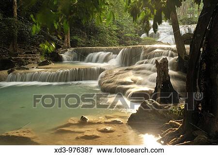 Erawan Waterfall, a seven-tiered waterfall in Erawan National Park, Kanchanaburi Province, Thailand View Large Photo Image Stock Photo - Erawan Waterfall, a seven-tiered waterfall in Erawan National Park, Kanchanaburi Province, Thailand. Fotosearch