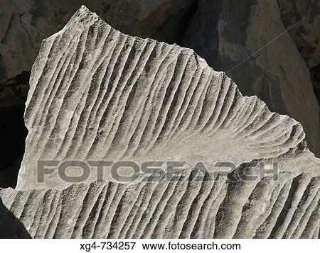 Eroded limestone by Ibon (glaciar lake) de Plan. Huesca province, Aragon, Spain View Large Photo Image Stock Photo - Eroded limestone by Ibon (glaciar lake) de Plan. Huesca province, Aragon, Spain. Fotosearch