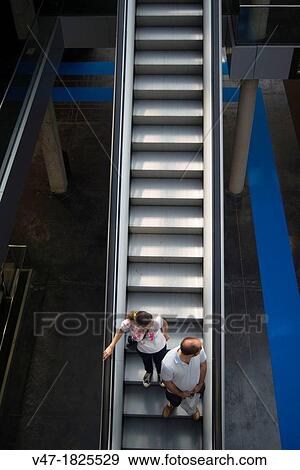 Escalators in a convention center, Valencia Spain View Large Photo Image Stock Photo - Escalators in a convention center, Valencia Spain. Fotosearch