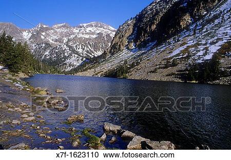 `Estany Llong?,Llong lake, Aig? estortes i Estany de Sant Maurici National Park, Pyrenees, Lleida province, Catalonia, Spain View Large Photo Image Stock Image - `Estany Llong?,Llong lake, Aig? estortes i Estany de Sant Maurici National Park, Pyrenees, Lleida province, Catalonia, Spain. Fotosearch