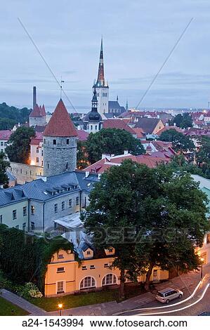 Picture - Estonia, Tallin City, The Old City Skyline W H, City walls and San Olav Church.. Fotosearch