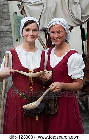 Estonia, Tallinn, Old Town, Raekoja Plats, Town Hall Square, young women in country costume, R, MR-EST-10-001 and MR-EST-10-002 View Large Photo Image Stock Photo - Estonia, Tallinn, Old Town, Raekoja Plats, Town Hall Square, young women in country costume, R, MR-EST-10-001 and MR-EST-10-002. Fotosearch