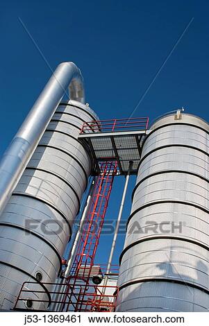 Stock Image - Ethanol plant distillation process equipment showing beer column and rectifier, Richardton, North Dakota. Fotosearch