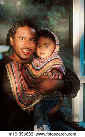 ethnic father and baby View Large Photo Image Stock Image - ethnic father and baby. Fotosearch