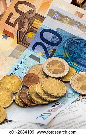 Euro banknotes and coins. View Large Photo Image Stock Photo - Euro banknotes and coins.. Fotosearch