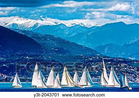 Stock Image - Europe, France, Alpes-Maritimes, Antibes. Les Voiles d'Antibes. Old sailing regatta collection, yachting trophy Paneira, a selection of the finest vintage yachts.. Fotosearch