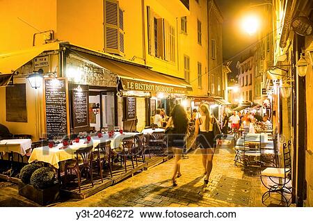 Europe, France, Alpes-Maritimes, Cannes. Tourists in old town at night. View Large Photo Image Stock Image - Europe, France, Alpes-Maritimes, Cannes. Tourists in old town at night.. Fotosearch