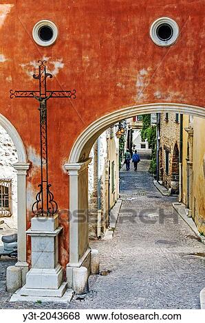 Europe, France, Alpes-Maritimes, Antibes. Alley in an old town. View Large Photo Image Stock Photo - Europe, France, Alpes-Maritimes, Antibes. Alley in an old town.. Fotosearch