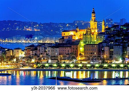 Europe, France, Alpes-Maritimes, Menton. Basilica Saint Michel and the marina at night. View Large Photo Image Stock Photograph - Europe, France, Alpes-Maritimes, Menton. Basilica Saint Michel and the marina at night.. Fotosearch