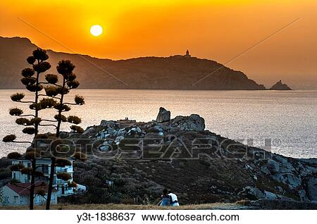 Europe, France, Corse, Haute-Corse, Calvi. Couple of lover at sunset. View Large Photo Image Stock Photo - Europe, France, Corse, Haute-Corse, Calvi. Couple of lover at sunset.. Fotosearch