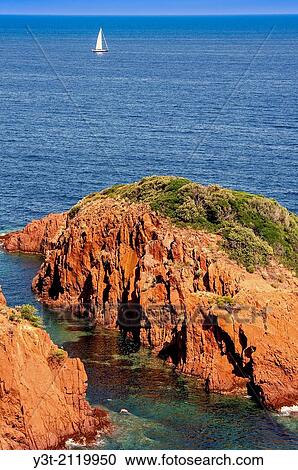 Europe, France, Var, Corniche de l? Esterel, Saint-Rapha? l. The red rocks of Cape Dramont. View Large Photo Image Stock Image - Europe, France, Var, Corniche de l? Esterel, Saint-Rapha? l. The red rocks of Cape Dramont.. Fotosearch