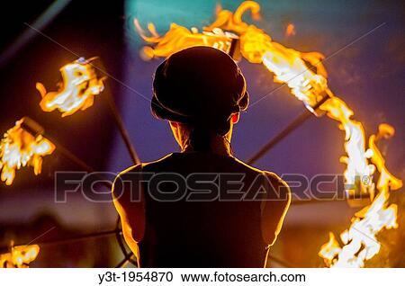Europe, France, Var, Fayence. Medieval Festival. Performance with a flaming wheel. View Large Photo Image Stock Image - Europe, France, Var, Fayence. Medieval Festival. Performance with a flaming wheel.. Fotosearch