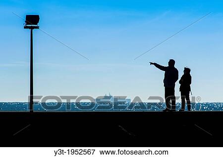 Europe, France, Var, Giens Peninsula. Couple of Tourist on the dock. View Large Photo Image Stock Photo - Europe, France, Var, Giens Peninsula. Couple of Tourist on the dock.. Fotosearch