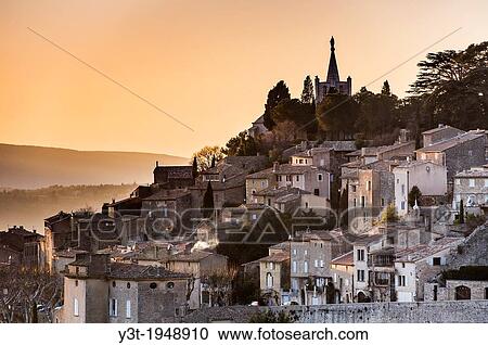Europe, France, Vaucluse, Luberon. The perched village of Bonnieux at dusk. View Large Photo Image Stock Image - Europe, France, Vaucluse, Luberon. The perched village of Bonnieux at dusk.. Fotosearch