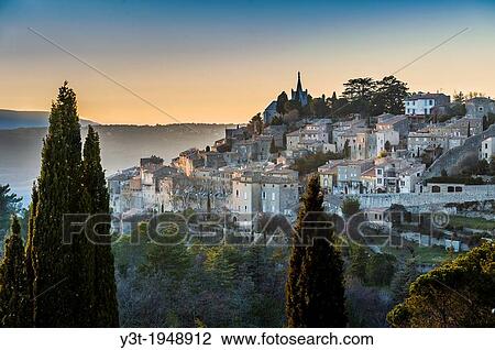 Europe, France, Vaucluse, Luberon. The perched village of Bonnieux at dusk. View Large Photo Image Stock Image - Europe, France, Vaucluse, Luberon. The perched village of Bonnieux at dusk.. Fotosearch