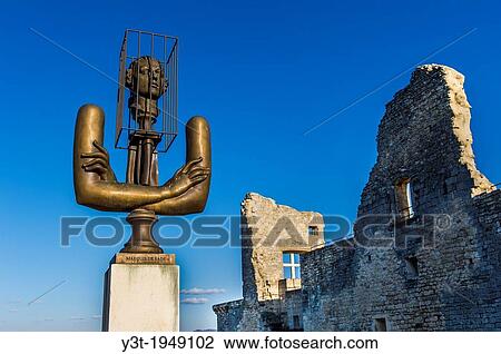 Europe, France, Vaucluse, Luberon. The perched village of Lacoste. Sculpture of Alexander Burganov "The Marquis de Sade" dedicated to Pierre Cardin in front of the ruins of the castle of the Marquis de Sade. View Large Photo Image Stock Image - Europe, France, Vaucluse, Luberon. The perched village of Lacoste. Sculpture of Alexander Burganov "The Marquis de Sade" dedicated to Pierre Cardin in front of the ruins of the castle of the Marquis de Sade.. Fotosearch