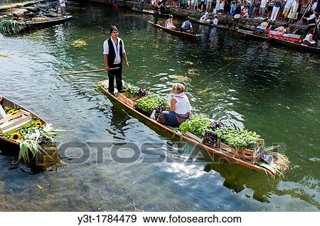 Europe, France, Vaucluse, Isle-sur-la-Sorgue, traditional floating market View Large Photo Image Stock Photo - Europe, France, Vaucluse, Isle-sur-la-Sorgue, traditional floating market. Fotosearch