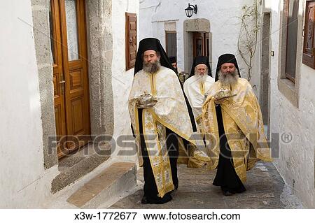 Stock Photo - europe, greece, dodecanese, patmos island, chora, orthodox easter time, procession of the icons. Fotosearch