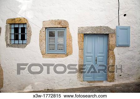 Stock Photography - europe, greece, dodecanese, patmos island, chora village, traditional house. Fotosearch