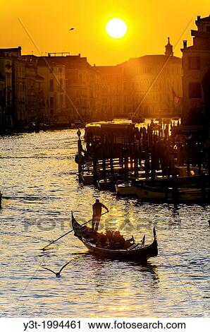 Europe, Italy, Veneto, Venice, classified as World Heritage by UNESCO. Gondola in the Grand Canale at sunset. View Large Photo Image Stock Image - Europe, Italy, Veneto, Venice, classified as World Heritage by UNESCO. Gondola in the Grand Canale at sunset.. Fotosearch
