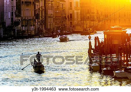 Europe, Italy, Veneto, Venice, classified as World Heritage by UNESCO. Gondola in the Grand Canale at sunset. View Large Photo Image Stock Image - Europe, Italy, Veneto, Venice, classified as World Heritage by UNESCO. Gondola in the Grand Canale at sunset.. Fotosearch