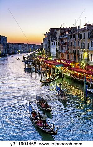 Europe, Italy, Veneto, Venice, classified as World Heritage by UNESCO. Gondola in the Grand Canale at sunset. View Large Photo Image Stock Photography - Europe, Italy, Veneto, Venice, classified as World Heritage by UNESCO. Gondola in the Grand Canale at sunset.. Fotosearch