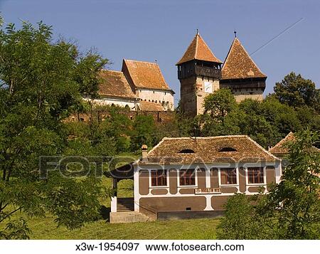 Stock Photo - europe, romania, transylvania, alma vii, fortified church and village.. Fotosearch