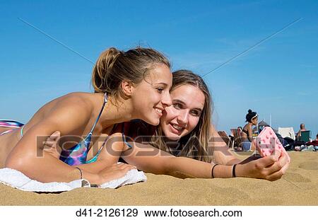 Europe, UK, England, Kent, Broadstairs girls on beach. View Large Photo Image Stock Photo - Europe, UK, England, Kent, Broadstairs girls on beach.. Fotosearch