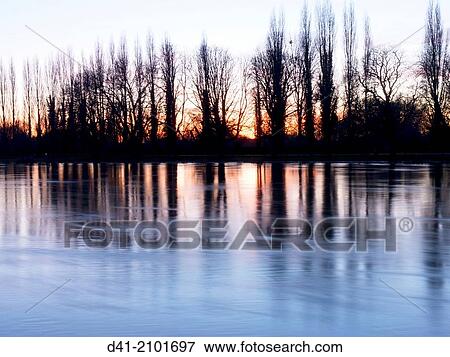 Europe, UK, England, Surrey, river thames scene sunset. View Large Photo Image Stock Photo - Europe, UK, England, Surrey, river thames scene sunset.. Fotosearch