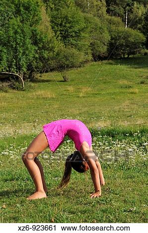European youth doing gymnastics in a meadow in the Pyrenees View Large Photo Image Stock Image - European youth doing gymnastics in a meadow in the Pyrenees. Fotosearch
