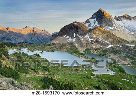 Eveing light over Russell Peak and Limestone Lakes Basin, Height-of-the-Rockies Provincial Park British Columbia Canada View Large Photo Image Stock Image - Eveing light over Russell Peak and Limestone Lakes Basin, Height-of-the-Rockies Provincial Park British Columbia Canada. Fotosearch