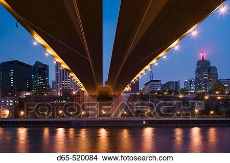 Picture - Evening City View along the Mississippi River from under the Wabasha Street Bridge. St. Paul. Minnesota. USA.. Fotosearch