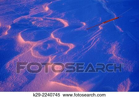 Evening light on the snow at the edge of Kelly Lake, Greater Sudbury, Ontario, Canada. View Large Photo Image Stock Photography - Evening light on the snow at the edge of Kelly Lake, Greater Sudbury, Ontario, Canada.. Fotosearch