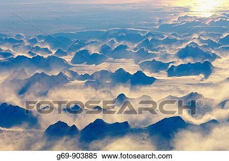 Evening light over a mountain range on Greenland, from above (October 2005) View Large Photo Image Stock Photography - Evening light over a mountain range on Greenland, from above (October 2005). Fotosearch