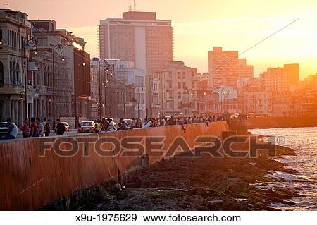 evening mood at Malecon in Havana, Cuba, Caribbean. View Large Photo Image Stock Photo - evening mood at Malecon in Havana, Cuba, Caribbean.. Fotosearch