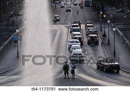 Stock Image - Evening road in the Maximilian Street in Munich. Fotosearch