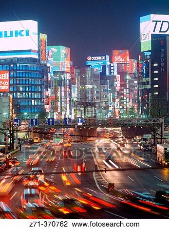Stock Image - Evening traffic, Shinjuku. Tokyo, Japan. Fotosearch